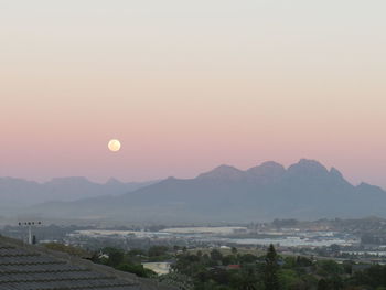 Scenic view of mountains against sky during sunset