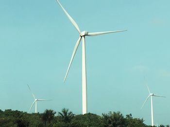 Low angle view of windmill against clear sky