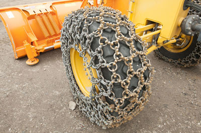 High angle view of chain on earthmover tire