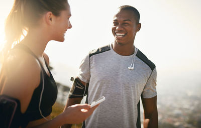 Happy athletes talking to each other