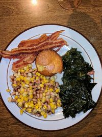 High angle view of vegetables in plate on table