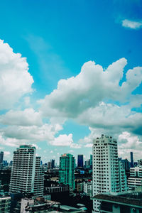 Modern buildings in city against sky