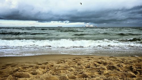 Scenic view of beach against sky