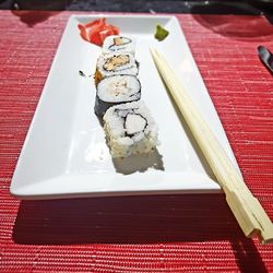 Close-up of sushi served on table