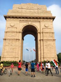 Group of people in front of historical building