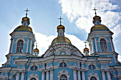 Low angle view of cathedral against cloudy sky