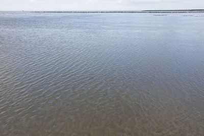 High angle view of sea shore against sky