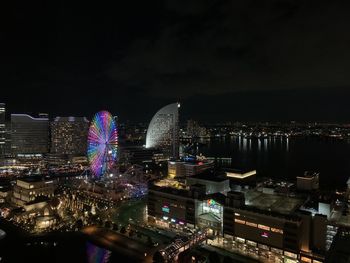 Illuminated buildings in city at night