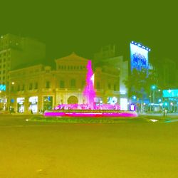 Multi colored building lit up at night