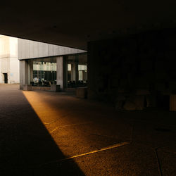 Empty walkway at night