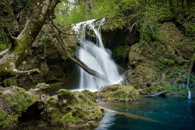 Stream flowing through rocks