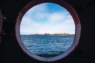 A view of and islan of south america from a boat window