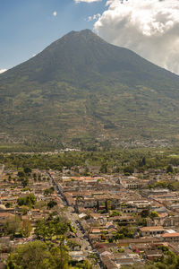 High angle view of mountain against cloudy sky