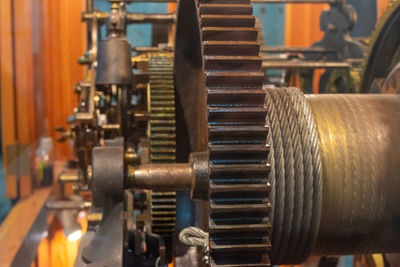 A detail of the tower clock mechanism with gearwheels