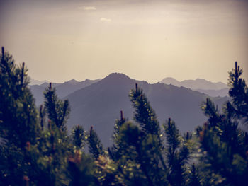 Scenic view of mountains against sky during sunset