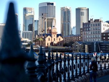 Modern buildings in city against sky