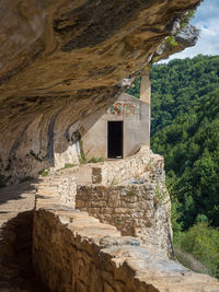 Low angle view of rock formations at hermitage  of san bartolomeo in legio