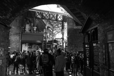 Group of people walking in building