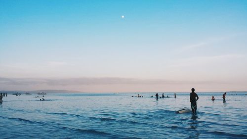 Scenic view of sea against sky at sunset