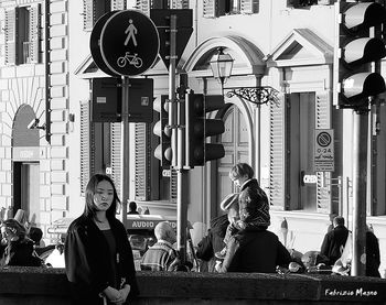Woman standing in front of building