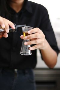 Close-up of a man drinking glass