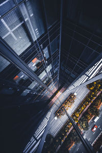 High angle view of illuminated railroad tracks in city