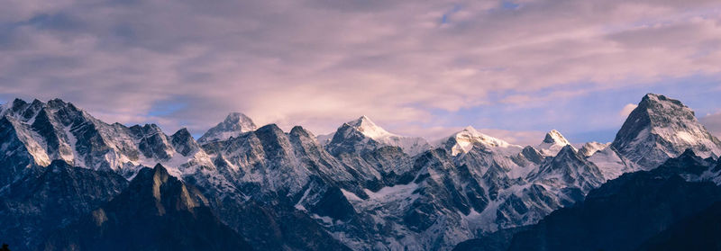 Panoramic view of himalayas against sky during sunset