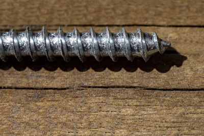 Close-up of metallic object on table