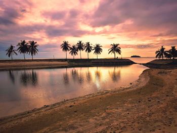 Scenic view of sea against sky at sunset