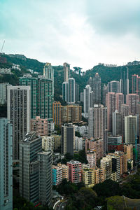 High angle view of buildings in city against sky