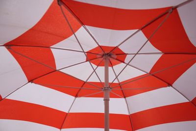 Low angle view of red umbrella