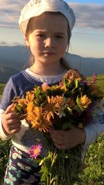 Close-up of a girl with flowers