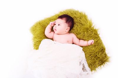 Portrait of young woman in white background