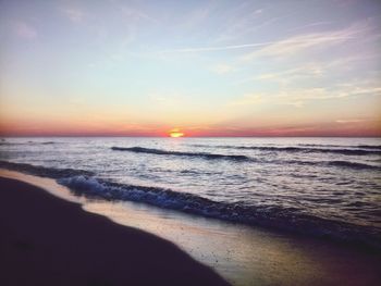 Scenic view of sea against sky during sunset