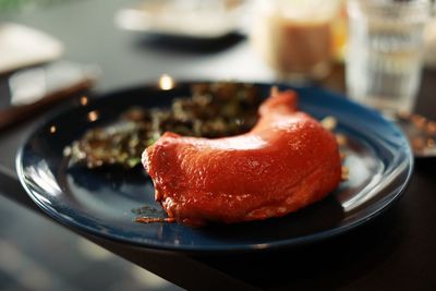 Close-up of chicken thighs in plate