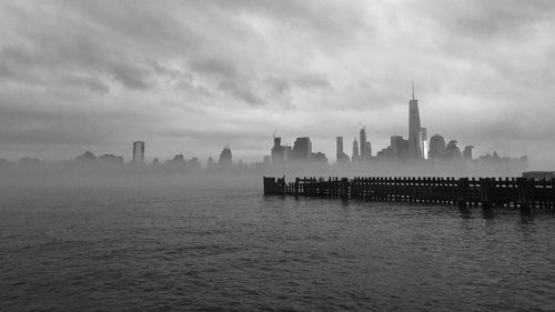 View of city against cloudy sky