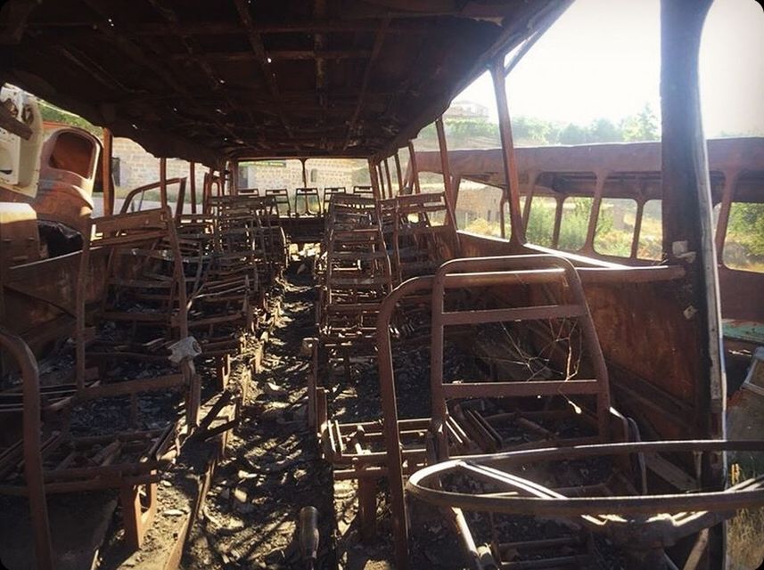 INTERIOR OF OLD ABANDONED BUS