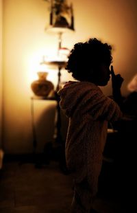 Girl standing at home