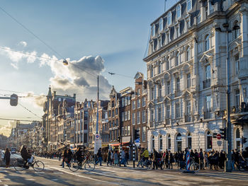 People walking on street in city