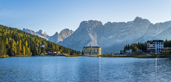 Scenic view of lake and mountains against sky