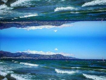 Scenic view of sea against blue sky