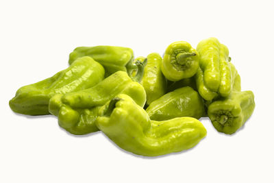 Close-up of green bell pepper against white background