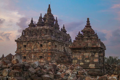 Low angle view of candi plaosan against sky