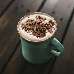 Close-up of coffee cup on table