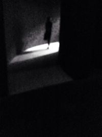 Close-up of woman in dark