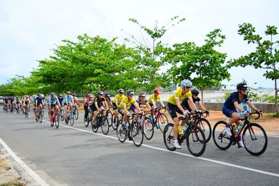 Cyclists riding bicycles during sports race 