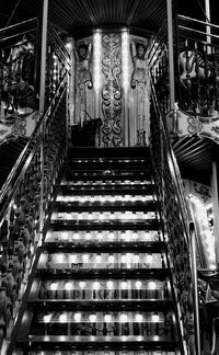 Low angle view of illuminated staircase in building