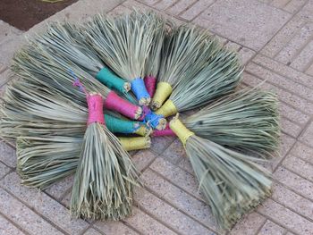 High angle view of brooms