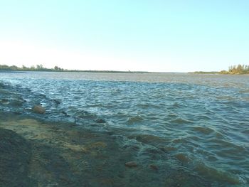 View of calm sea against clear sky