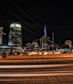 Light trails on city street at night